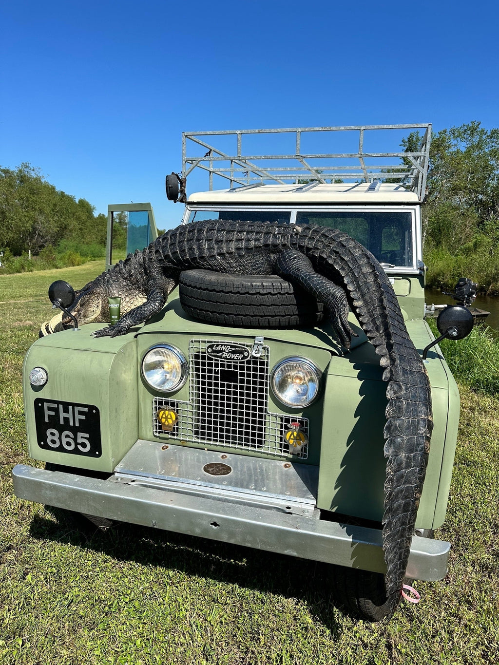 HUNT Refined Repellent Jeep with an alligator on the hood.