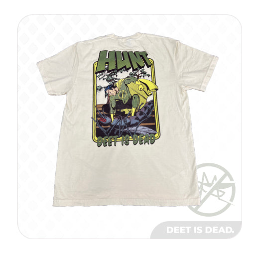 A product photo of the back of the "DEET IS DEAD" Short Sleeve Graphic T-shirt. The back of the shirt features a print of a superhero in a green suit with a logo of a mosquito with a cross through it and a yellow cape. He is holding a mosquito down in a swamp. The words "DEET IS DEAD" and "HUNT" are visible on the beige shirt.