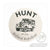 A product photo of the "HUNT Refined Repellent est. 2024" decal from the HUNT Refined Repellent Decal Four Pack. It is a decal featuring the words "HUNT Refined Repellent est. 2024" on a white background. There is a drawing of the company rover in the center.
