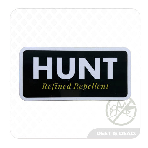 Sticker with 'HUNT Refined Repellent' text on a dark green background.
