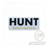 Sticker with "HUNT Refined Repellent" text on a white background.