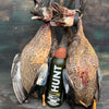 A photo of a bundle of ducks with HUNT Refined Repellent Spray.