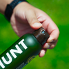 An up close photo of a bottle of HUNT Refined Repellent Spray.
